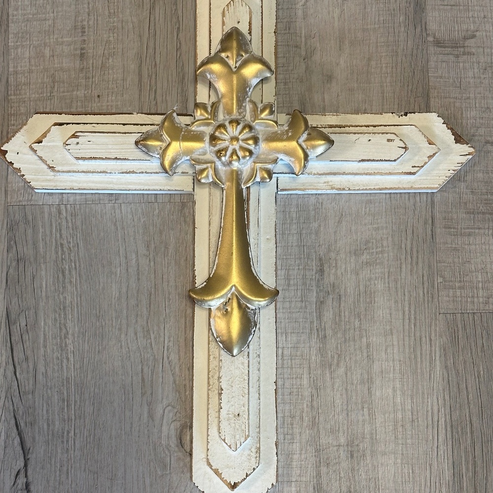 Wooden white distressed cross with gold cross in the center